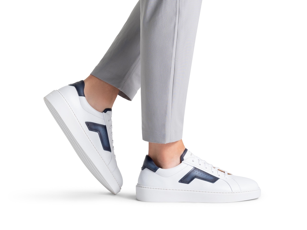 The Phoenix White / Navy pairs well with light grey pants