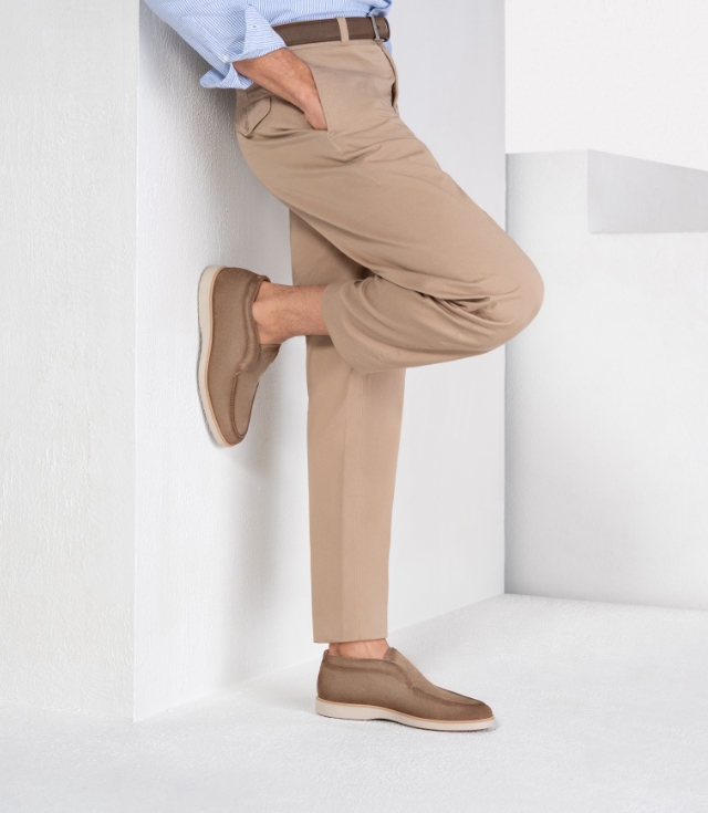 Elevate a business casual fit with the Loda Taupe Suede slip-on boot.